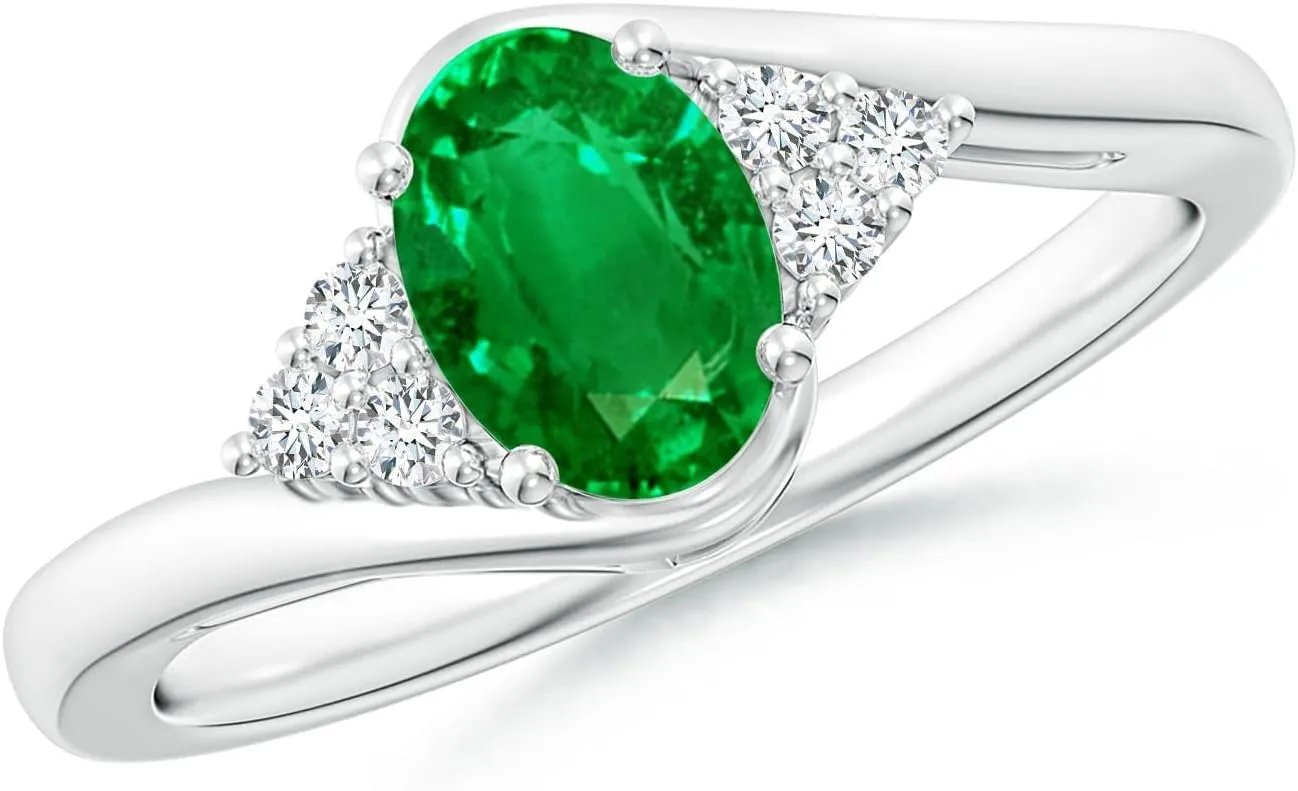 Angara Lab Grown Oval Emerald Bypass Ring with Trio Diamond Accents in 14K Solid Gold/Platinum | May Birthstone, Birthday, Engagement, Anniversary, Wedding Jewelry Gift for Women