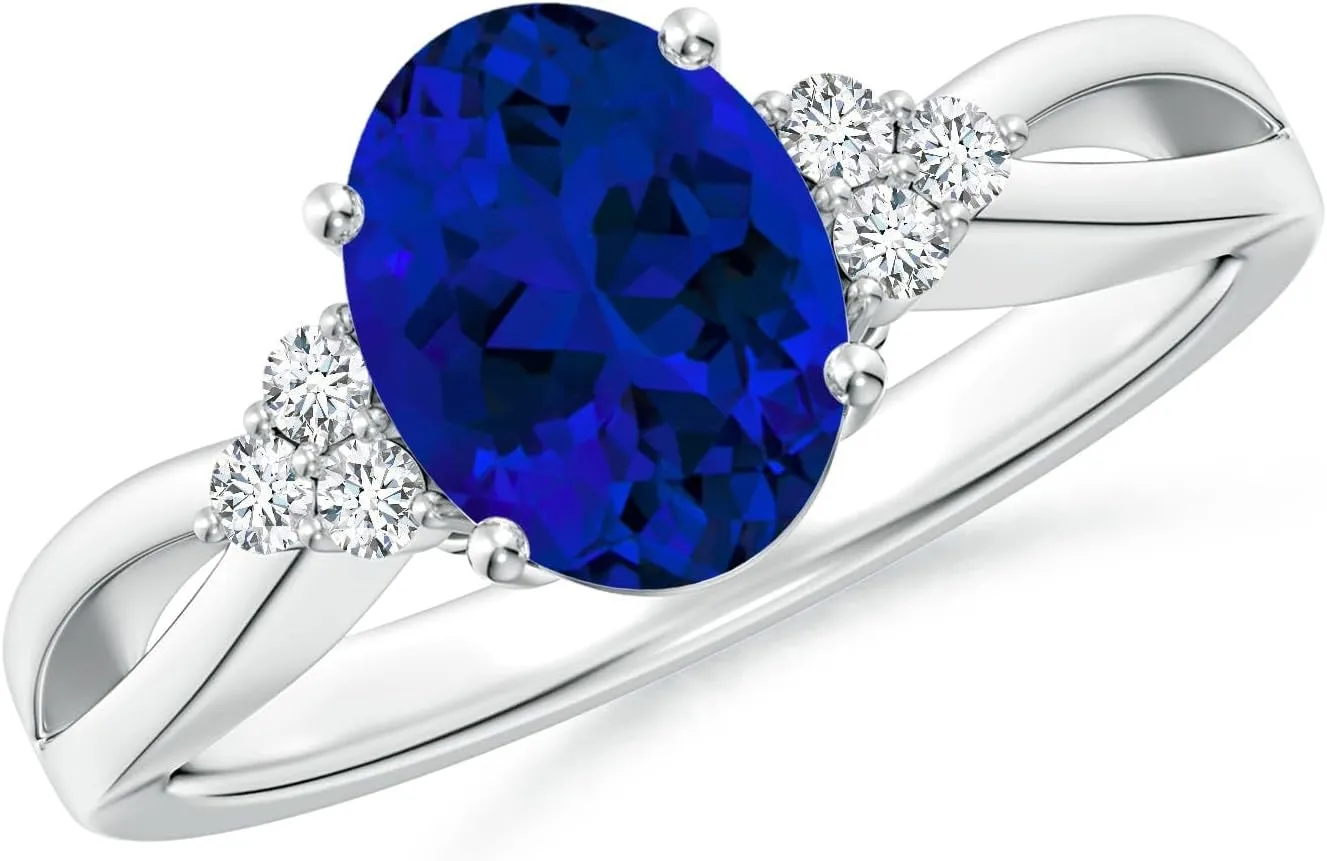 Angara Lab Grown Solitaire Oval Blue Sapphire Split Shank Ring with Trio Lab Diamonds in Silver / 14K Solid Gold/Platinum | Birthday, Engagement, Anniversary, Wedding Jewelry Gift for Women