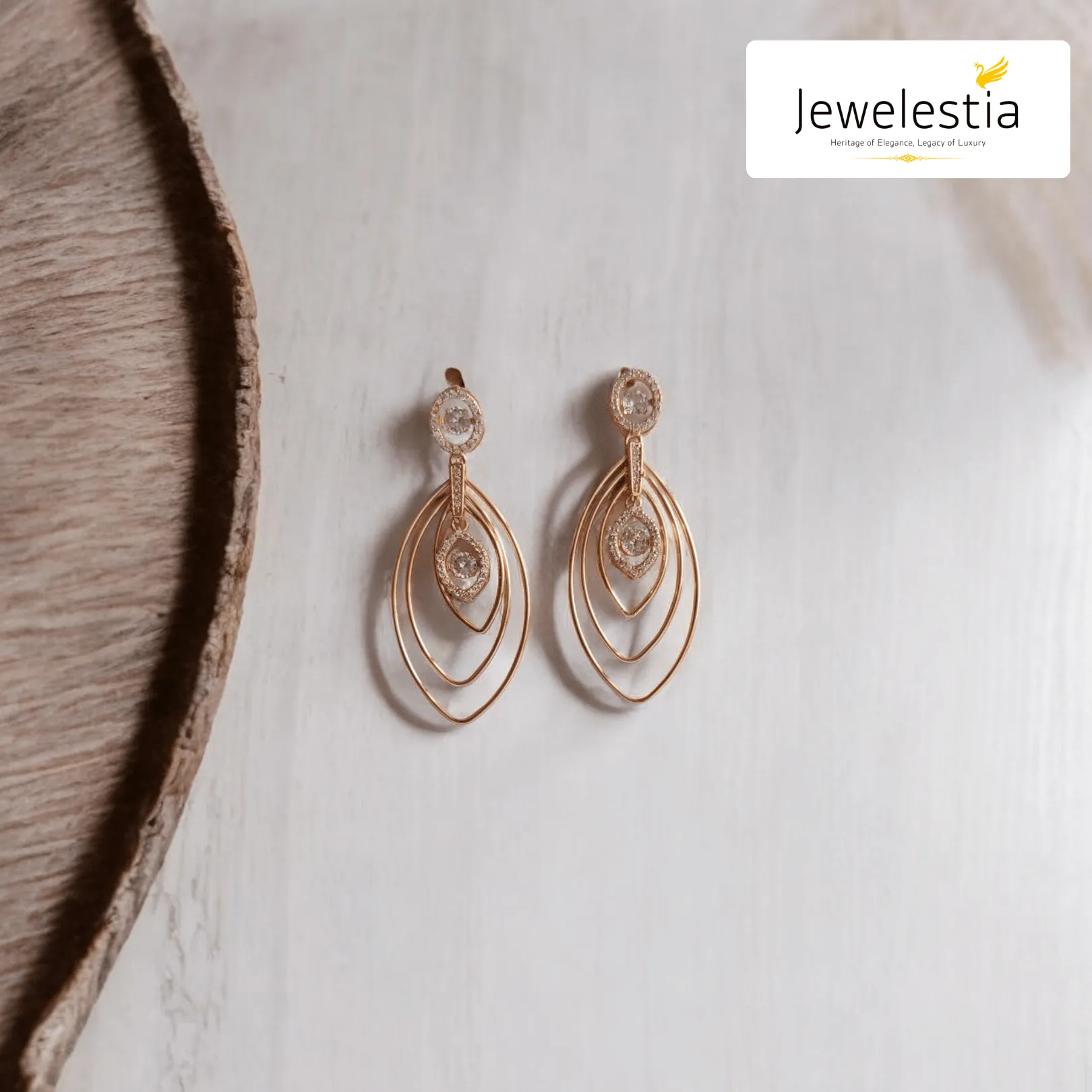 Jewelestia Radiant Rose Gold Dangle Earrings