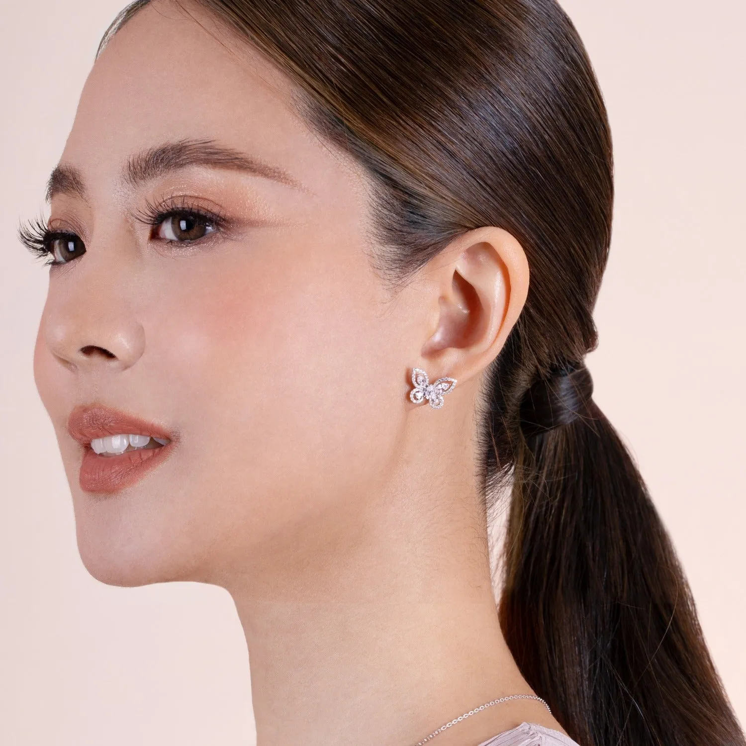 Papillon: Silver rhodium plated with Marquise-cut CZ glasswing butterfly stud earrings